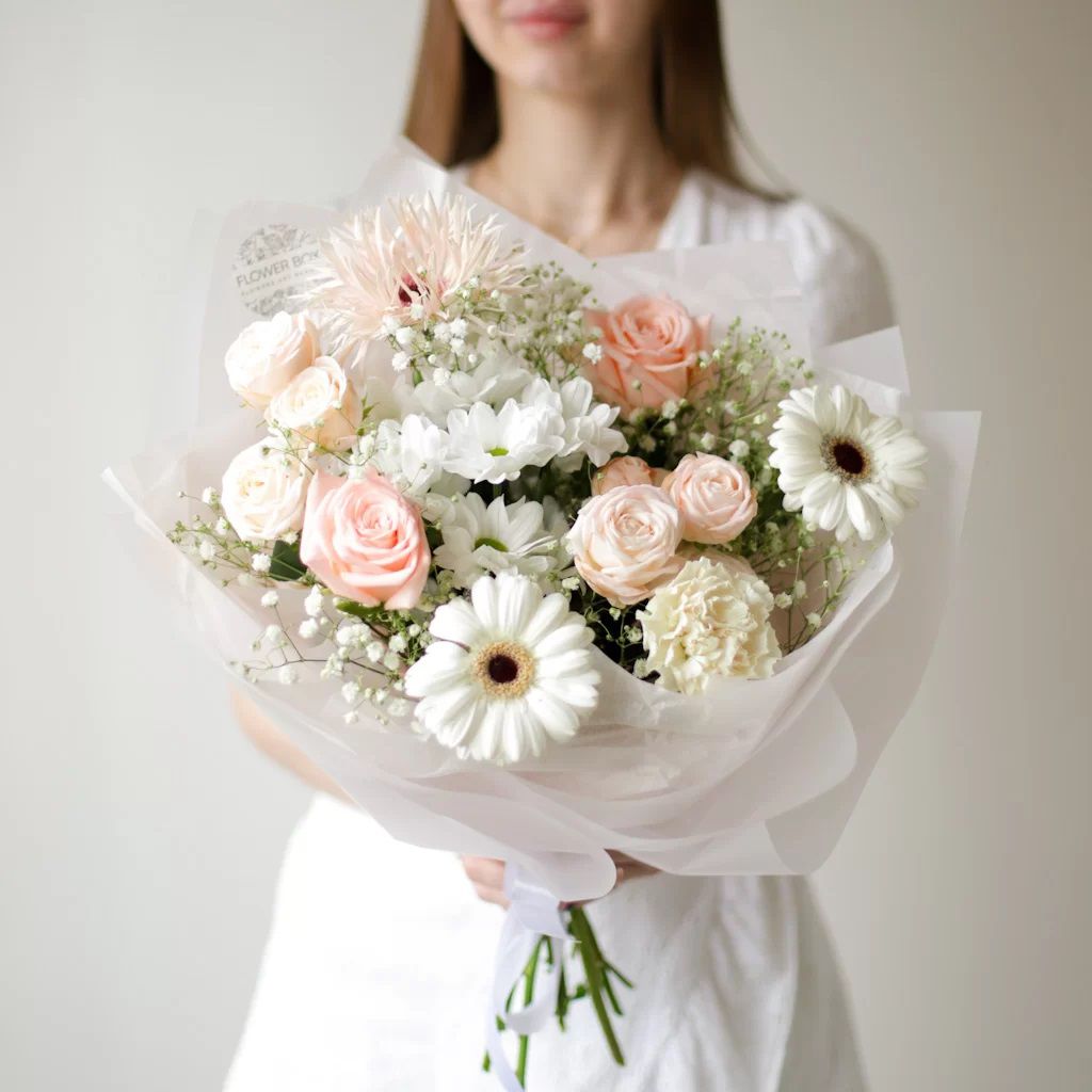 A bouquet with gypsophila in soft colors